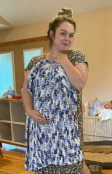 Satisfied customer with blue baby blanket